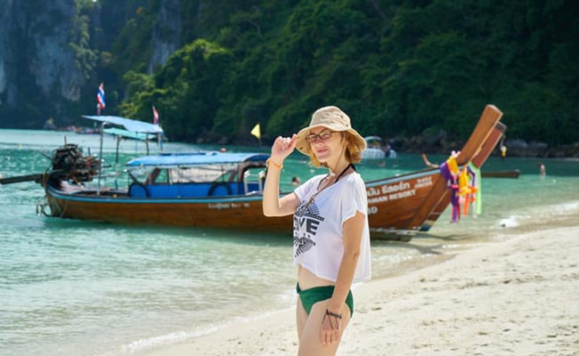 female-traveler-beach-thailand